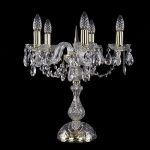 Настольная лампа Bohemia Ivele выполнена в виде свечей с подсвечниками  