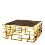 Журнальный столик  золотого цвета 