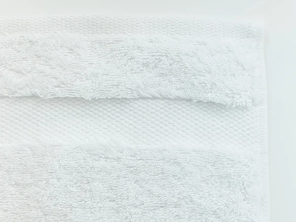 0c296a43812d6f6bab341614749aa704 Полотенце махровое Rubi белый — изображение 3