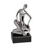 10K9274C Статуэтка "Женщина" (сид.на боку) серебряная 11х9х21